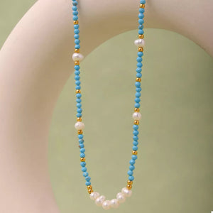 Freshwater Pearl, 18K Gold-Plated, Stainless Steel, Turquoise Care instructions: necklace in gold with fitted silhouette