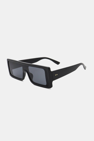 Black rectangular sunglasses with dark lenses and gold stud accents.