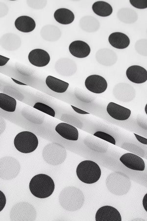 Chic polka dot mesh mock neck shirt in white with black and grey dots, sheer fabric.