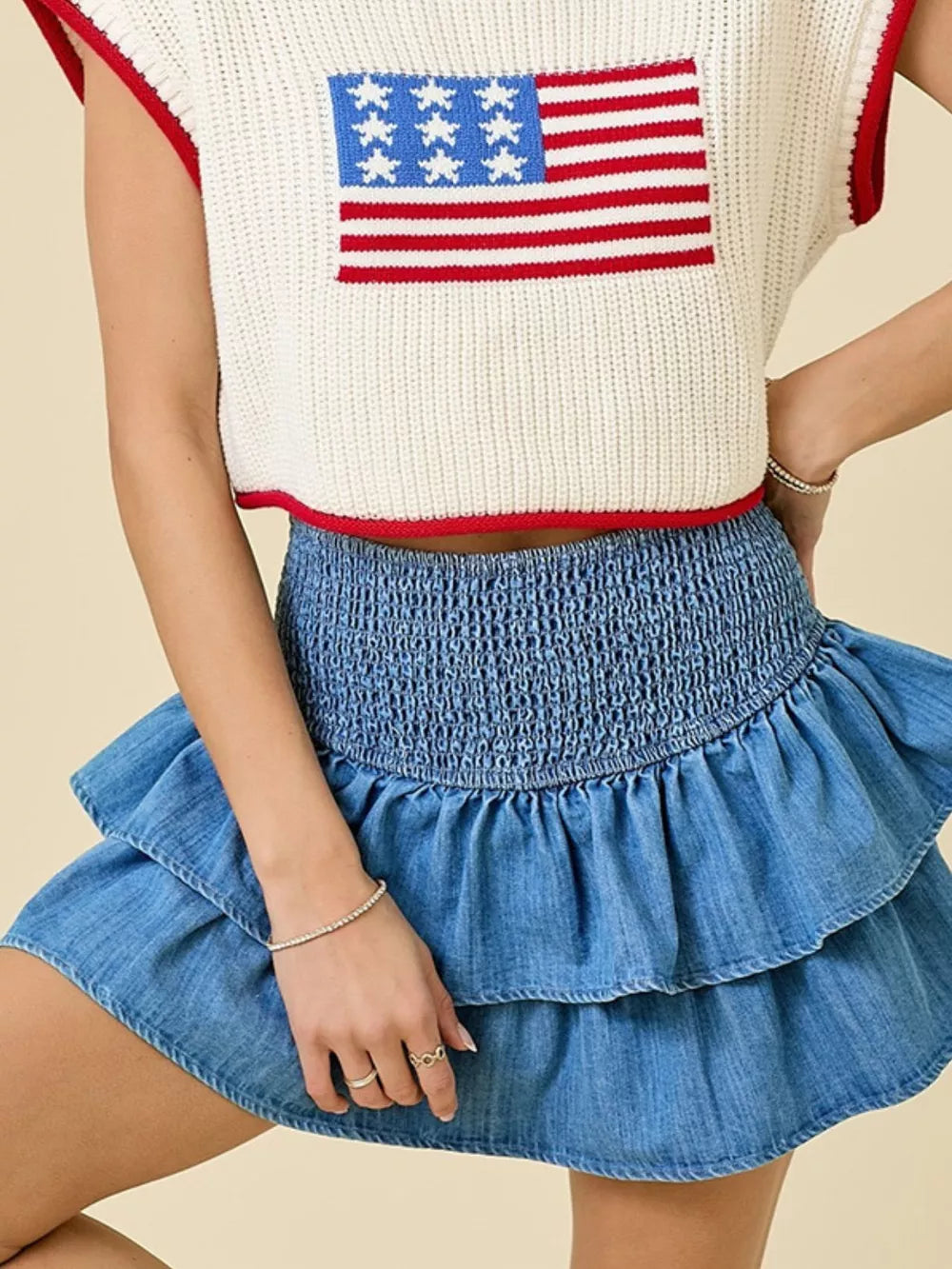 Flirty tiered ruffle denim skirt in blue with smocked waist