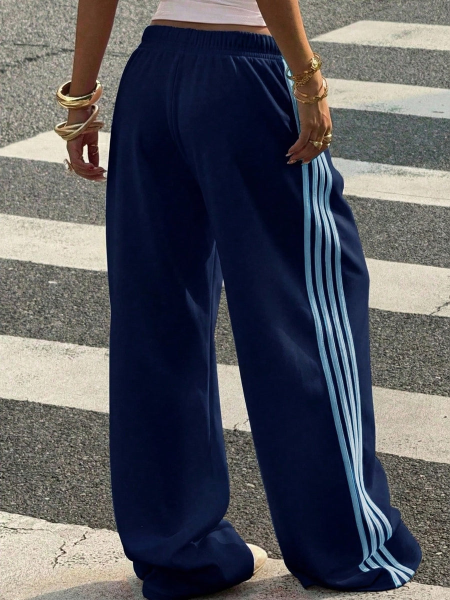 track pants in Navy with high-waisted and full-length