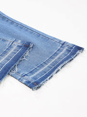 Whiskered wash cropped jeans in blue denim with frayed hem detail