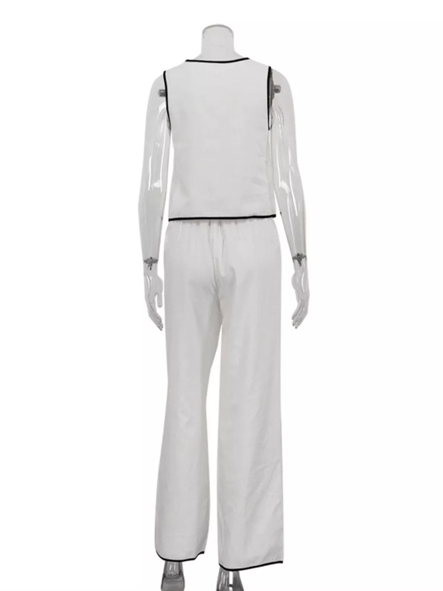 White sleeveless top and wide-leg pants set with black trim