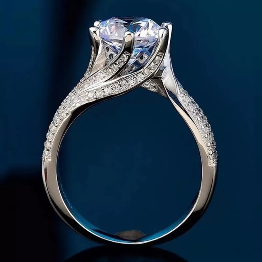 Dazzling moissanite silver ring with certificate, 3 carat brilliant cut center stone and pave band.
