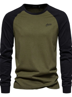 Army green and black colorblock raglan long sleeve tee with embroidered logo.