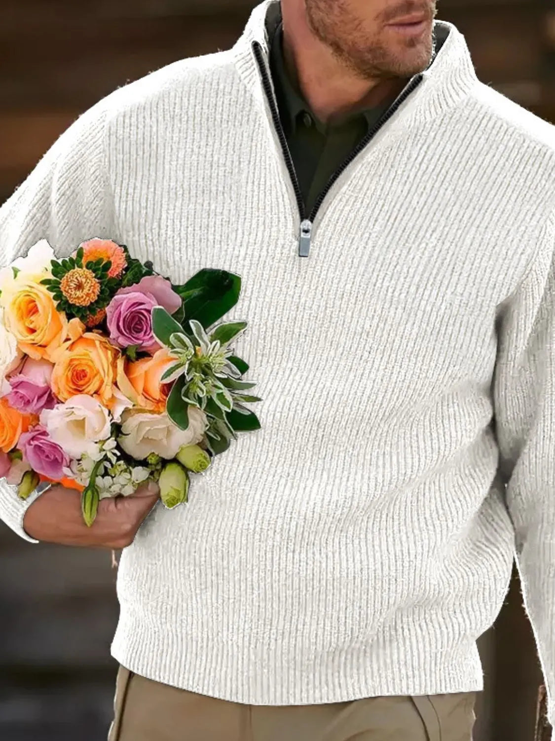 Textured ribbed quarter-zip sweater in white with a dark green collared shirt underneath.