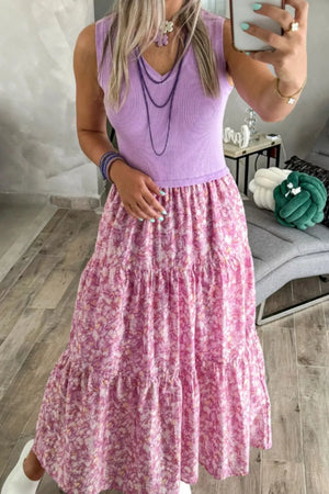 Floral tiered maxi dress with ribbed lilac bodice and pink floral skirt.