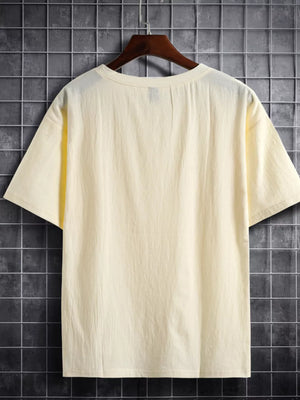 Light green cotton crew neck t-shirt with short sleeves and a relaxed fit.