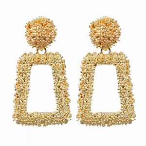 Gold geometric dangle earrings with textured finish