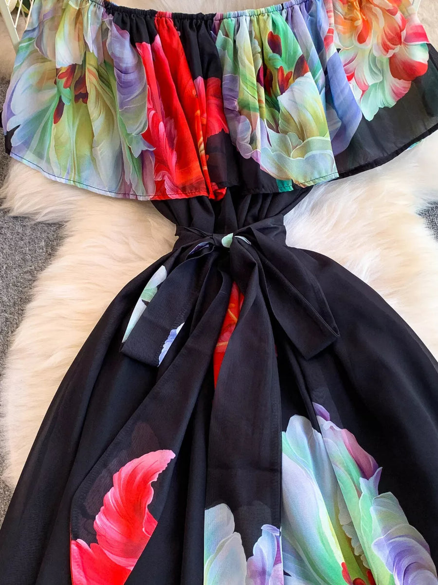 Botanical print off-shoulder A-line dress with ruffled neckline and belted waist.