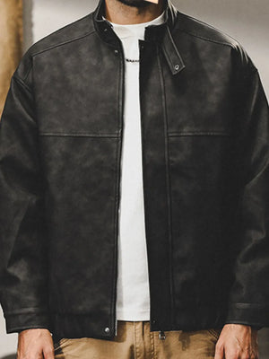Black distressed leather bomber jacket with stand collar and zipper closure