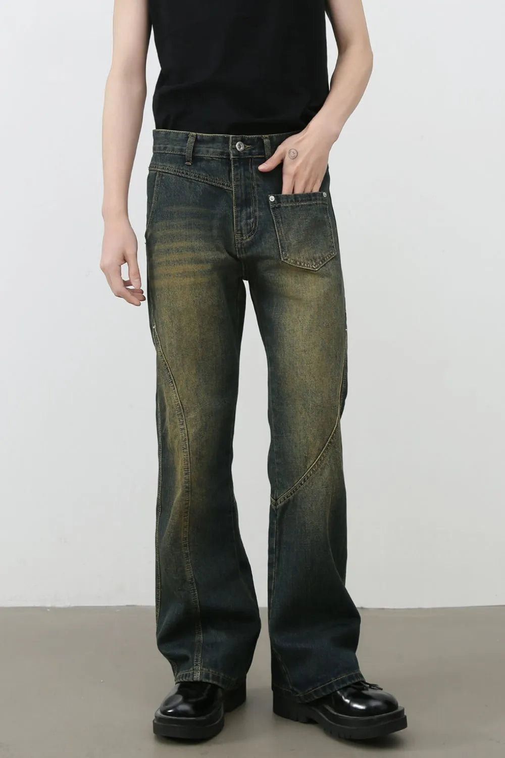 Dark faded seam detail bootcut jeans with a distressed wash.