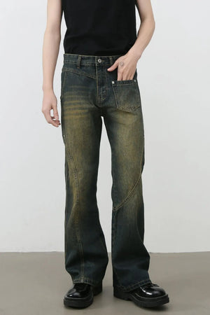 Dark faded seam detail bootcut jeans with a distressed wash.