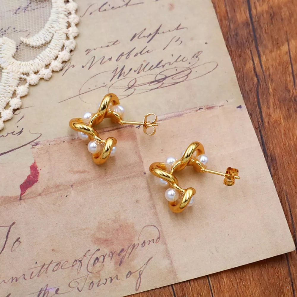 earrings in gold featuring pearl embellishment and fitted fit