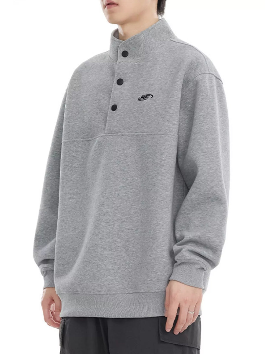 Plus-size grey cotton blend sweatshirt with buttoned neckline and embroidered logo.