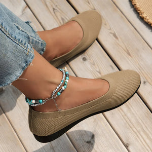 Khaki textured knit slip-on ballet flats with a beaded anklet.
