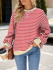 Striped crew neck sweatshirt in red and white with cream trim and cuffs.