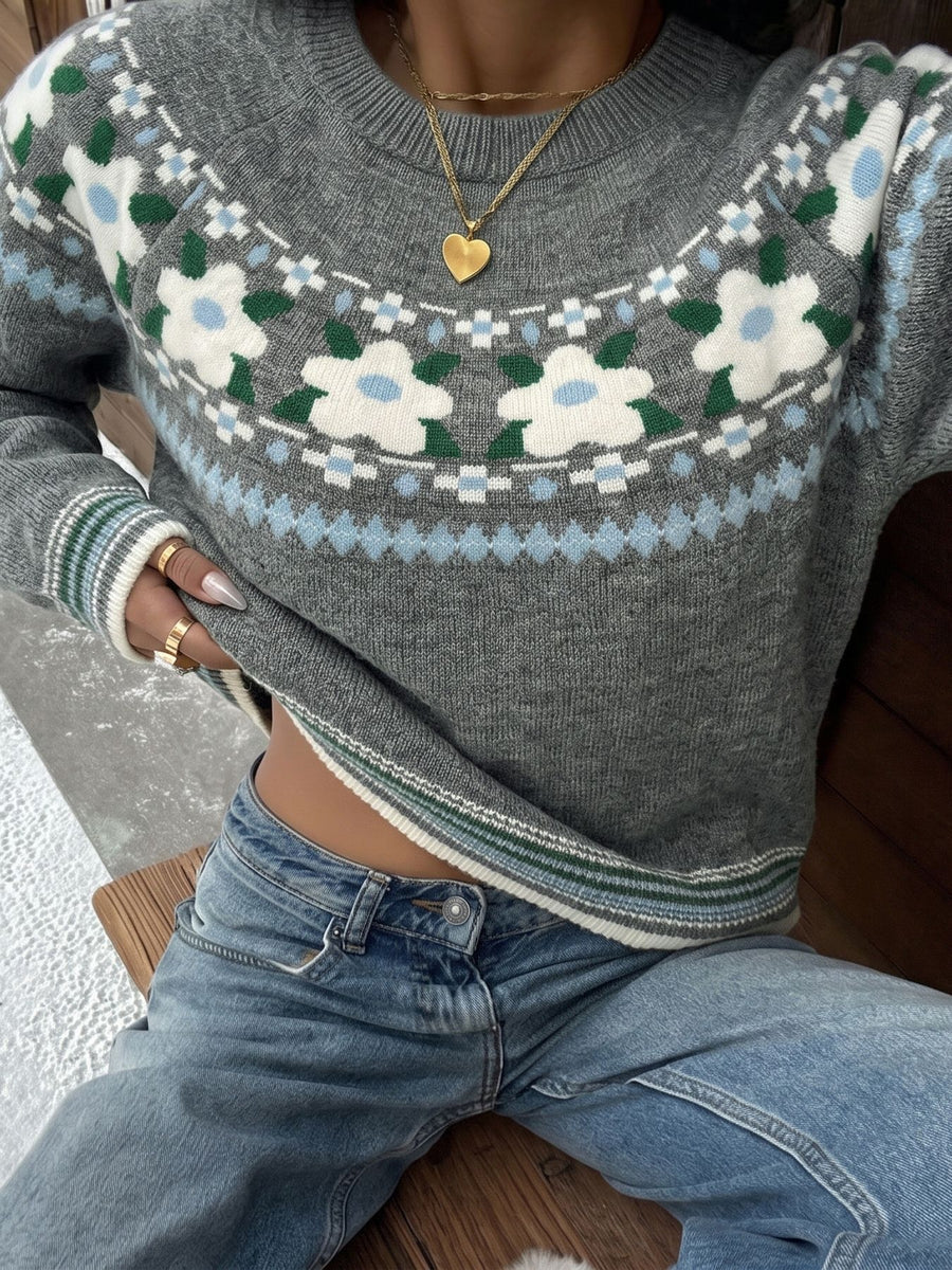 white pullover sweater featuring stretch and floral