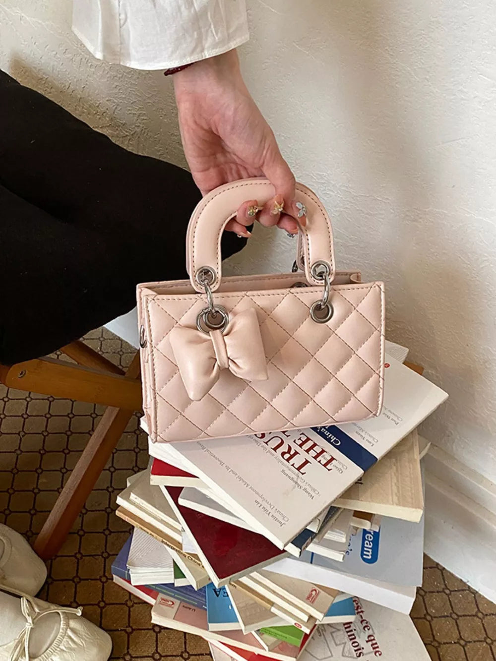 Quilted Bow Mini Crossbody Bag in blush pink with quilted