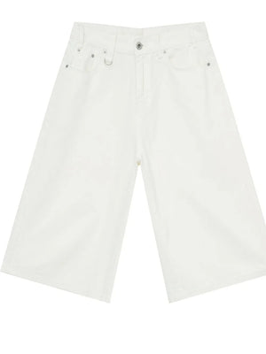 Ivory wide-leg distressed denim culottes with buttoned fly and metal hardware.