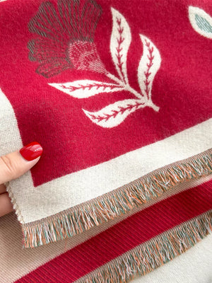 Red floral print fringed shawl with cream border and fringe detail