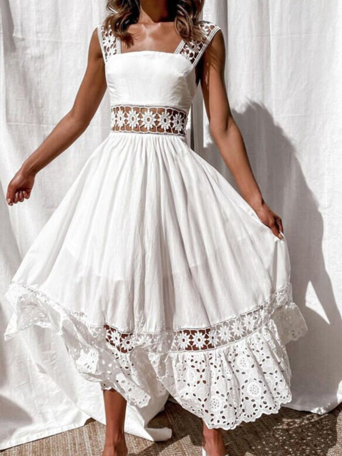 White openwork crochet sleeveless midi dress with cutout waist and tiered hem