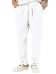 White linen drawstring relaxed fit trousers with pockets and adjustable waist