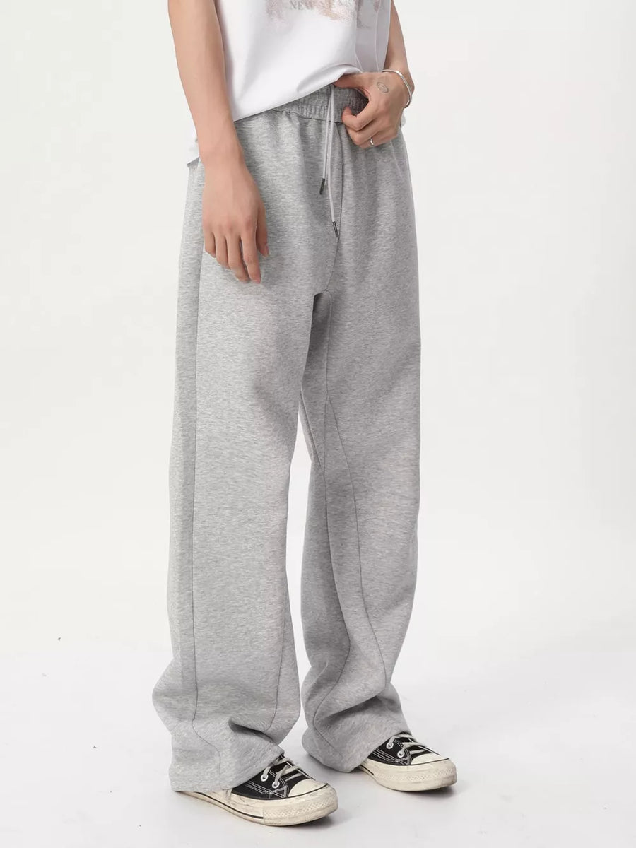 Relaxed fit sweatpants in Flower Gray with adjustable drawstring waist and wide leg.