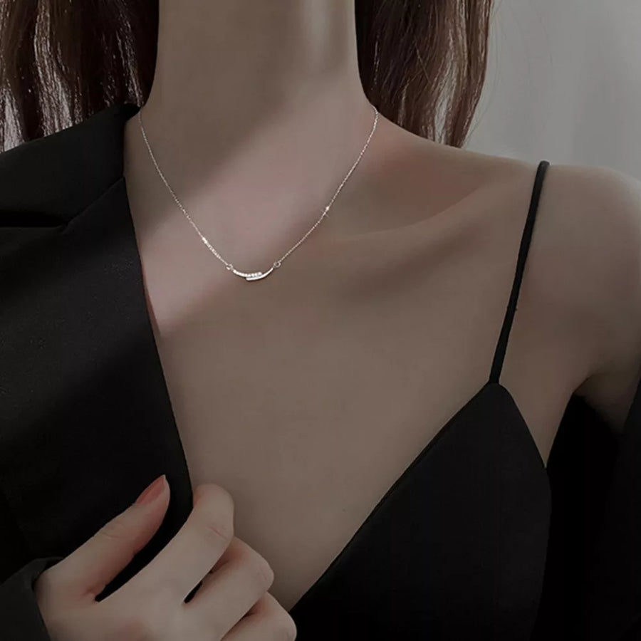 necklace in gold with rhinestone embellishment and collar length