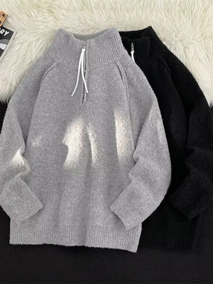 Men's gray half-zip sweater with high neck and white drawstring detail
