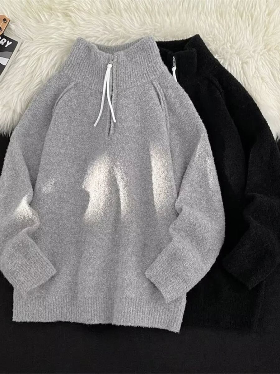 Men's gray half-zip sweater with high neck and white drawstring detail