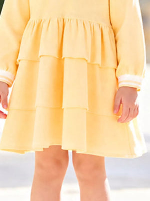 light yellow shirt dress with mini and half-button
