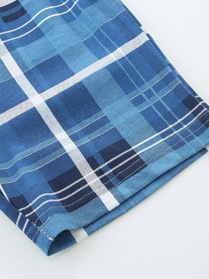 Boys' cotton shorts in blue plaid with white and navy accents.