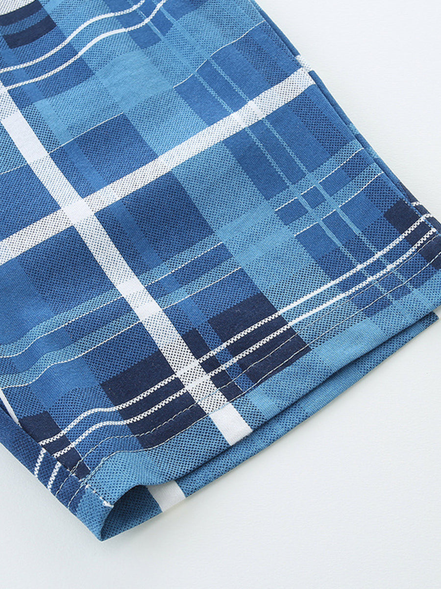 Boys' cotton shorts in blue plaid with white and navy accents.