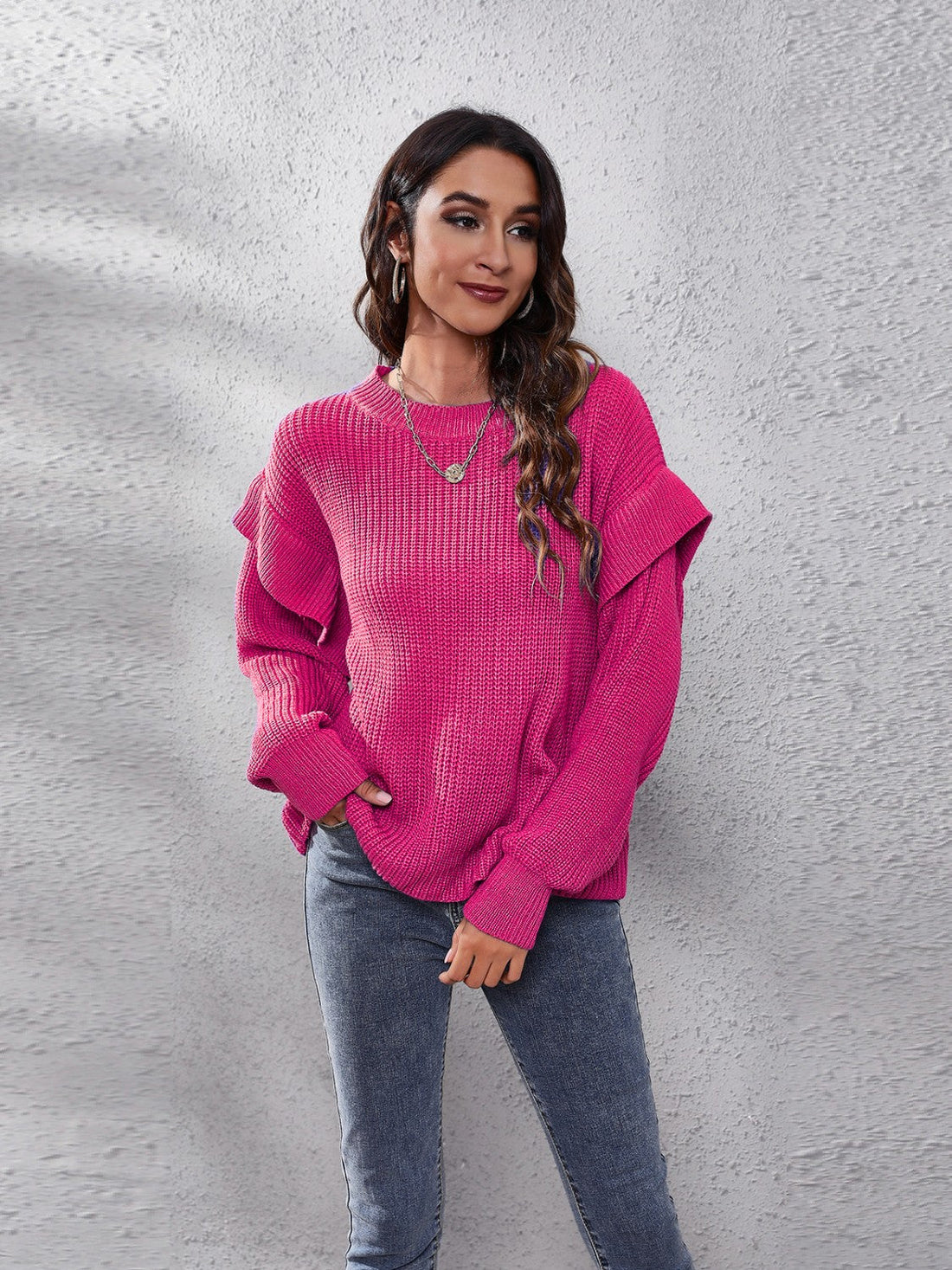 Cerise ruffled sleeve ribbed knit pullover sweater with crew neck.