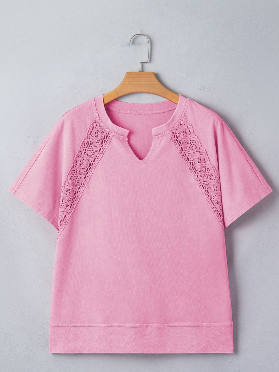 Pink mineral wash cotton tee with notched neck and lace inset details.