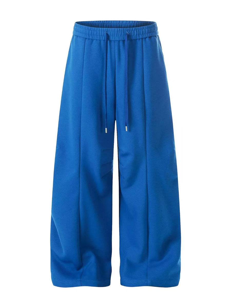 95%polyester, 5%spandex Care instructions: Machine wash cold sweatpants in Apricot with wide-leg silhouette