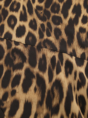 Print bodycon maxi skirt in brown and black animal print fabric.