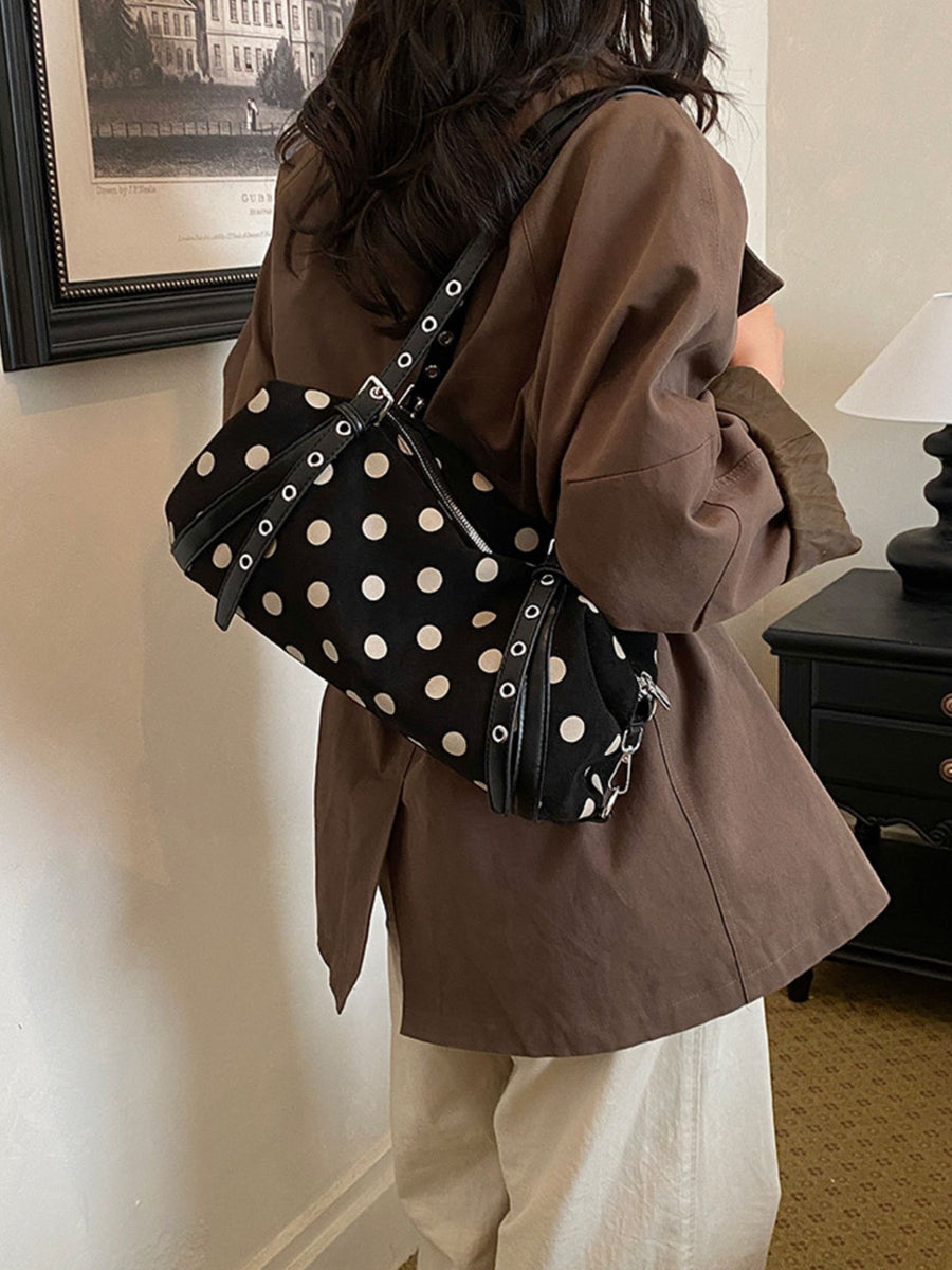 ivory shoulder bag featuring polka dot print and polka dot