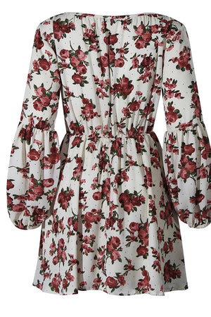 mini dress in White with floral and smocked