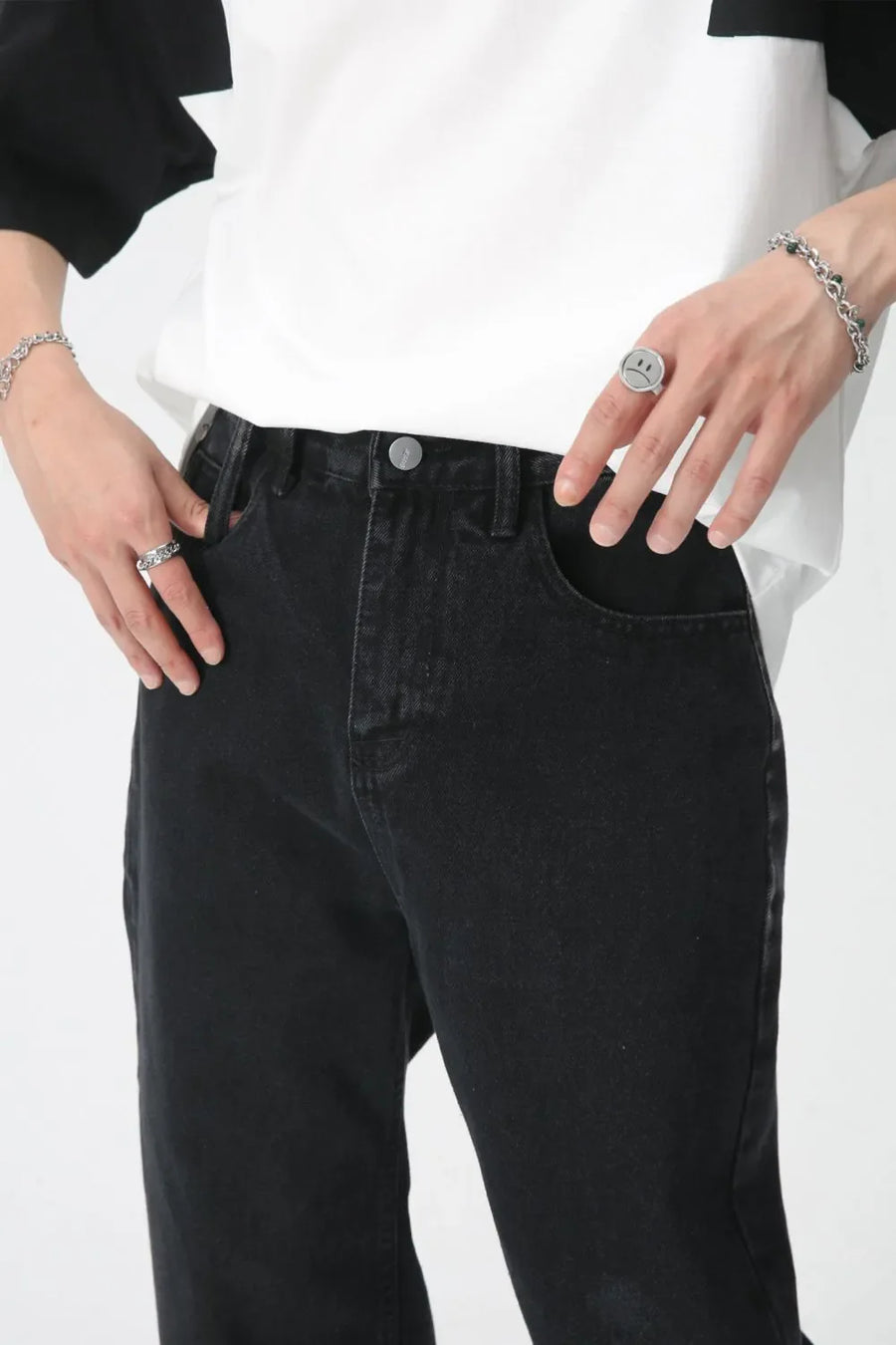Wide-leg washed black denim trousers with a comfortable, casual fit.