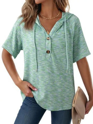 Green waffle knit hooded t-shirt with buttons and drawstring, short sleeves.