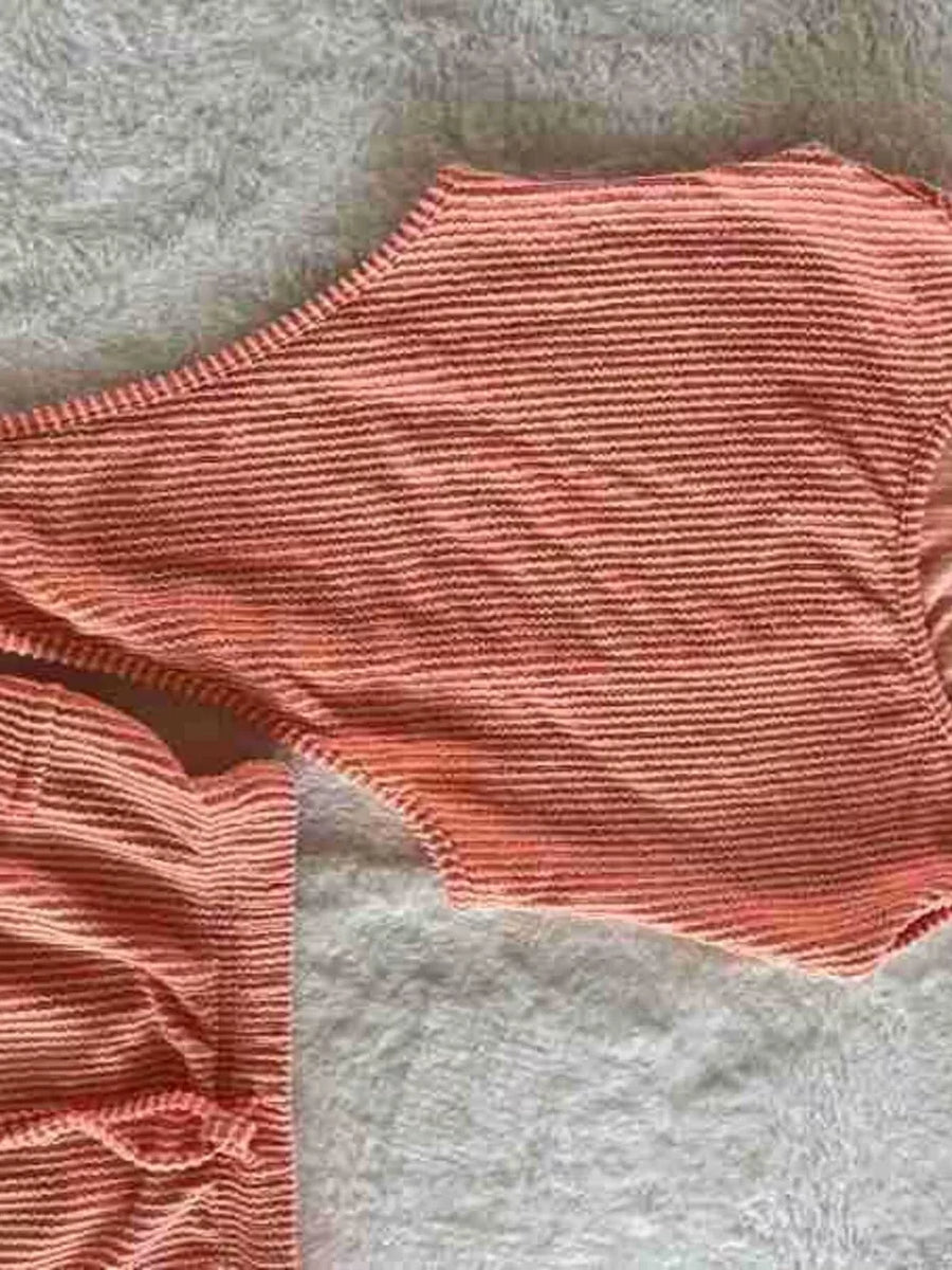 Coral striped textured one-shoulder bikini top with matching drawstring bottoms.