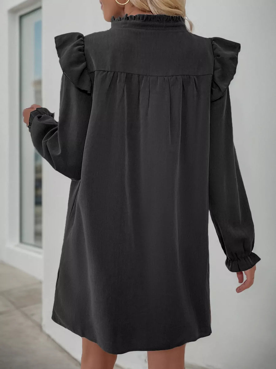 Dark gray ruffled notched sleeve dress with a high neckline and long sleeves.