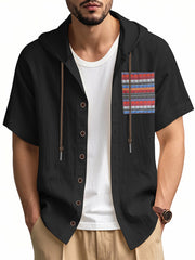 Black hooded short sleeve shirt with patterned chest pocket and button front.