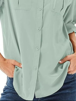 Light Green roll-sleeve button-up shirt with chest pockets and a relaxed fit.
