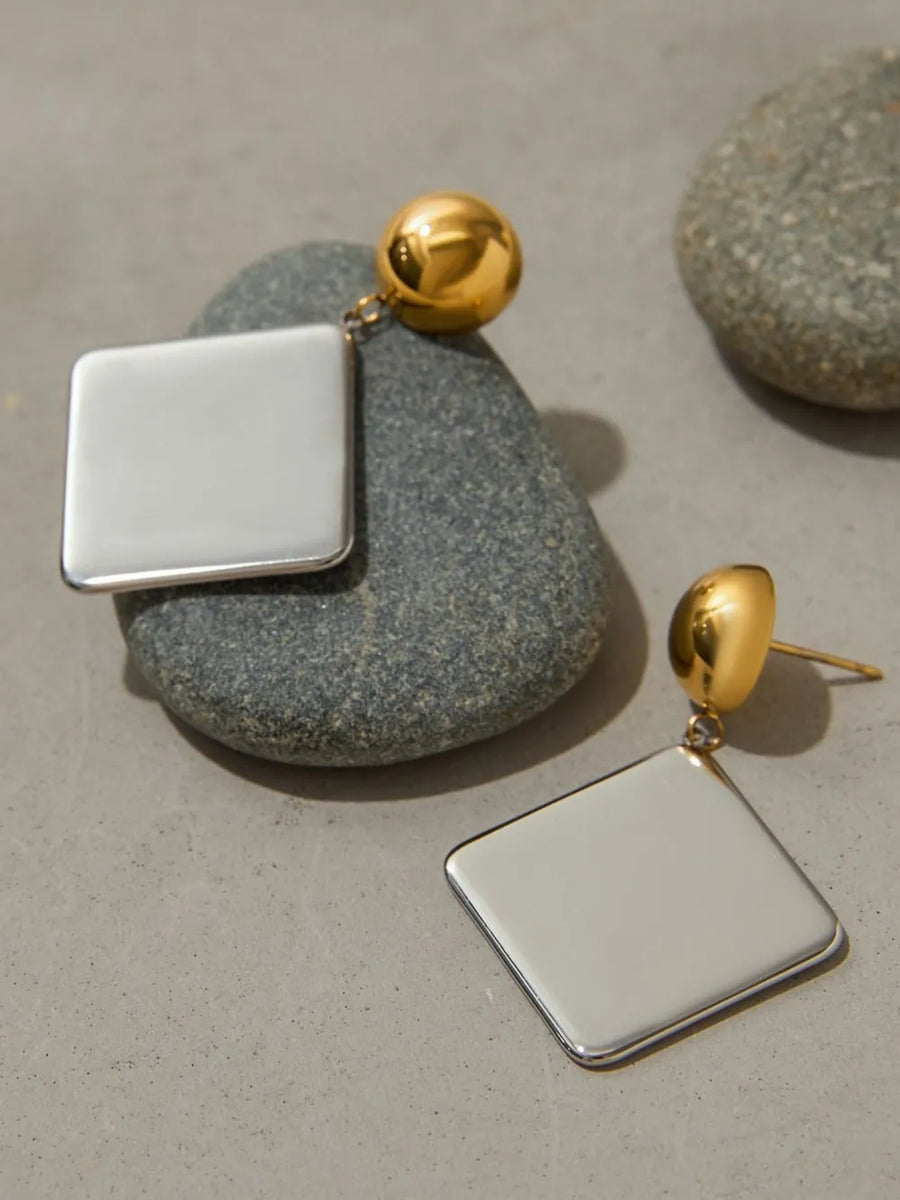 earrings in ivory with geometric design and medium length