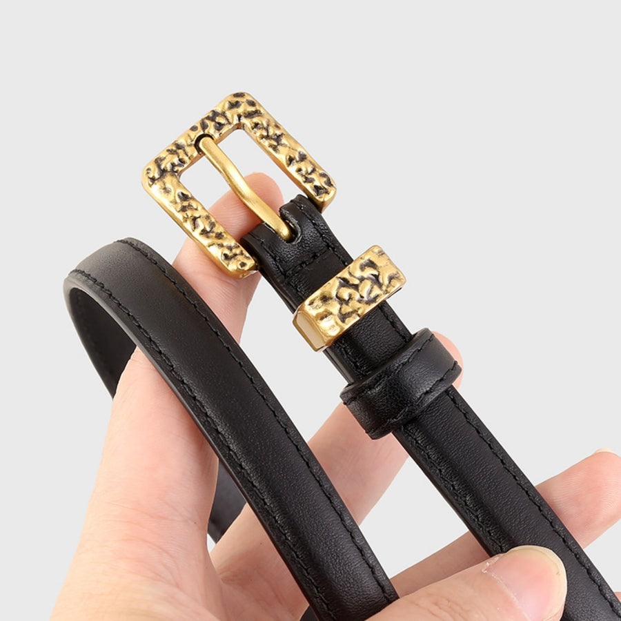 Black cowhide leather belt with ornate gold buckle and keeper.