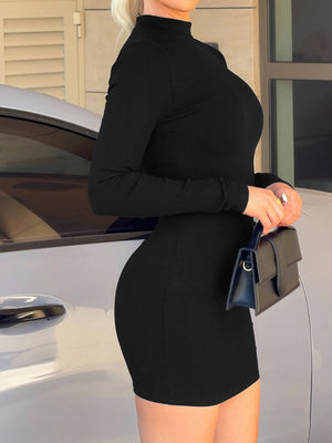Black bodycon dress featuring stretch and ribbed knit