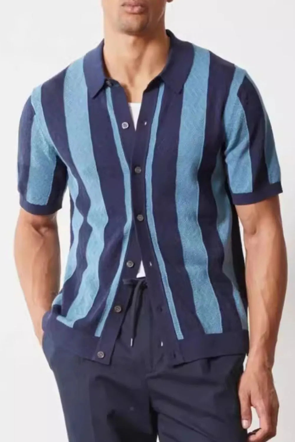 Men's navy short sleeve button-up shirt with bold blue stripes.